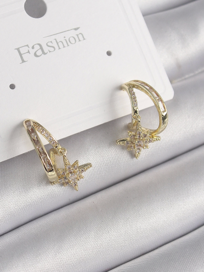 pirinc-gold-renk-zirkon-tasli-halka-model-yildiz-detay-kadin-kupe-147274267-sw1200sh1800